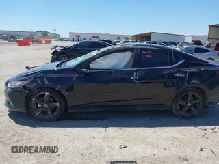 2022 Nissan Sentra SR z VIN 3N1AB8DV0NY313438, wystawiony jako IAAI lot #42076992 z przebiegiem Nie podano mil oraz . Historia ofert i sprzedaży dostępna na DreamBid. Obrazek 14.