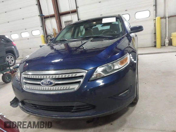 2011 Ford Taurus SEL with VIN 1FAHP2EW7BG174493, listed as a IAAI auction lot 41697856 with 143,957 mi miles. Bid and sale history available at carsss.com. Image 12.