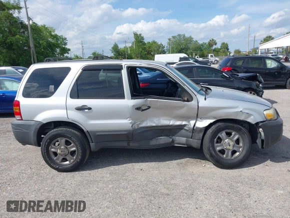 2005 Ford Escape XLS Value with VIN 1FMYU02Z35KD87671, listed as a IAAI auction lot 41880824 with 278,689 mi miles. Bid and sale history available at carsss.com. Image 13.