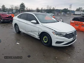 2019 Volkswagen Jetta S z VIN 3VWCB7BU6KM128871, wystawiony jako IAAI lot #41485151 z przebiegiem 154 533 mil mil oraz . Historia ofert i sprzedaży dostępna na DreamBid. Obrazek 1.