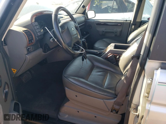 2002 Land Rover Discovery with VIN SALTW12452A769021, listed as a Copart auction lot 71550244 with 83,679 mi miles and Salvage Title. Bid and sale history available at DreamBid. Image 7.