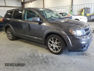 2018 Dodge Journey GT with VIN 3C4PDCEG6JT380458, listed as a Copart auction lot 57725795 with 130,329 mi miles and Salvage title. Bid and sale history available at DreamBid. Image 4.