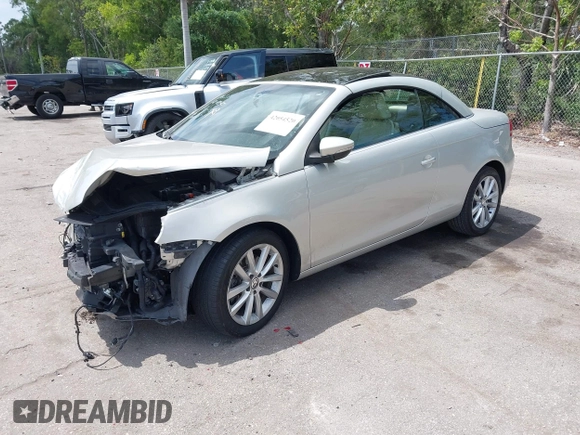 2012 Volkswagen Eos Komfort with VIN WVWBW7AHXCV006075, listed as a IAAI auction lot 42054520 with 104,037 mi miles and . Bid and sale history available at DreamBid. Image 2.
