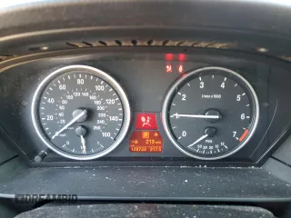 2010 BMW 5 Series 550i with VIN WBANW5C53ACT56674, listed as a Copart auction lot 70927084 with 129,722 mi miles and Salvage Title. Bid and sale history available at DreamBid. Image 9.