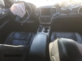 2017 Jeep Grand Cherokee Overland with VIN 1C4RJFCG1HC778818, listed as a Copart auction lot 87368764 with 62,471 mi miles and Salvage Title. Bid and sale history available at carsss.com. Image 8.