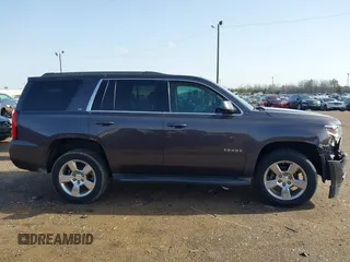 2016 Chevrolet Tahoe LT z VIN 1GNSCBKC3GR238392, wystawiony jako IAAI lot #41443009 z przebiegiem 95 163 mil mil oraz . Historia ofert i sprzedaży dostępna na DreamBid. Obrazek 13.
