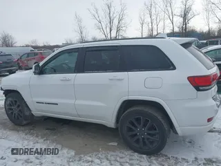 2018 Jeep Grand Cherokee Laredo E with VIN 1C4RJFAG1JC499457, listed as a IAAI auction lot 41379459 with 127,344 mi miles and . Bid and sale history available at DreamBid. Image 15.