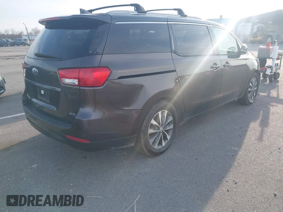 2016 Kia Sedona EX with VIN KNDMC5C1XG6159271, listed as a IAAI auction lot 41409277 with 95,696 mi miles. Bid and sale history available at carsss.com. Image 4.