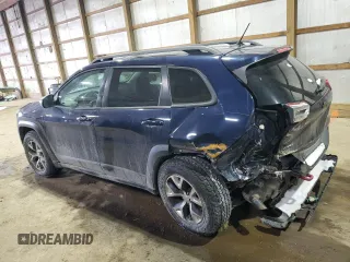 2014 Jeep Cherokee Trailhawk with VIN 1C4PJMBB9EW124371, listed as a Copart auction lot 42038105 with 137,717 mi miles and Salvage Title. Bid and sale history available at carsss.com. Image 2.