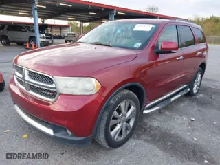 2013 Dodge Durango Crew with VIN 1C4RDHDG1DC680545, listed as a IAAI auction lot 41060253 with 197,216 mi miles. Bid and sale history available at carsss.com. Image 2.