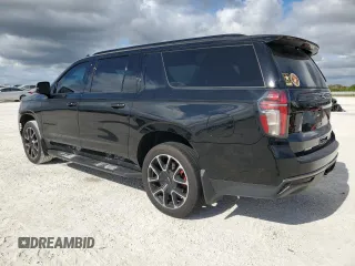 2022 Chevrolet Suburban with VIN 1GNSCEKT7NR222257, listed as a Copart auction lot 84840904 with 113,761 mi miles and Salvage title. Bid and sale history available at DreamBid. Image 2.