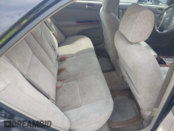 2003 Toyota Camry LE with VIN 4T1BE30K33U243758, listed as a IAAI auction lot 42169032 with 260,336 mi miles and . Bid and sale history available at DreamBid. Image 8.