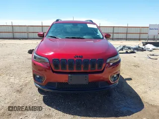 2019 Jeep Cherokee Latitude Plus with VIN 1C4PJMLB7KD384984, listed as a IAAI auction lot 42243845 with 60,914 mi miles and . Bid and sale history available at DreamBid. Image 13.