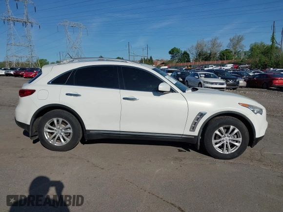2013 Infiniti FX with VIN JN8CS1MWXDM170526, listed as a IAAI auction lot 42123275 with 171,778 mi miles and . Bid and sale history available at DreamBid. Image 14.