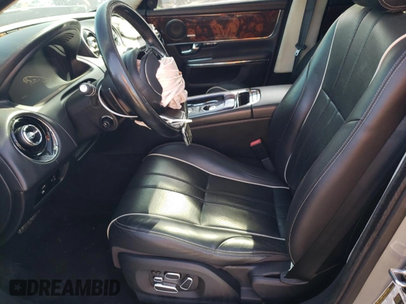 2011 Jaguar XJ with VIN SAJXA2GE5BMV13122, listed as a Copart auction lot 73113044 with 164,196 mi miles and Salvage Title. Bid and sale history available at DreamBid. Image 7.