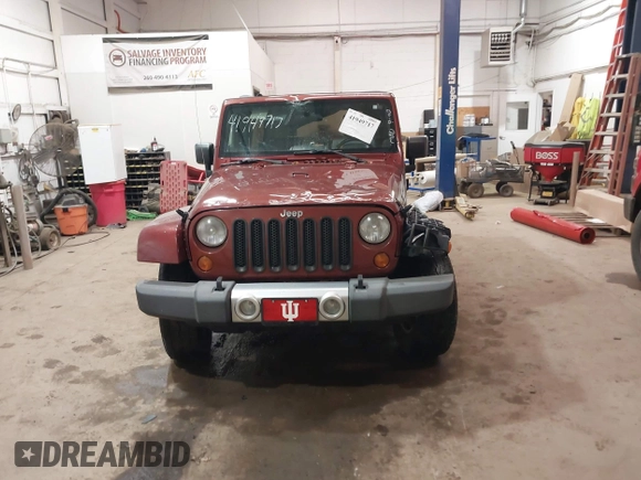 2008 Jeep Wrangler Unlimited Sahara z VIN 1J4GA59178L514002, wystawiony jako IAAI lot #41949717 z przebiegiem Nie podano mil oraz . Historia ofert i sprzedaży dostępna na DreamBid. Obrazek 12.