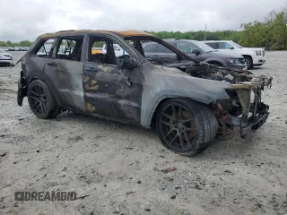 2012 Jeep Grand Cherokee SRT8 with VIN 1C4RJFDJ0CC113413, listed as a Copart auction lot 51763425 with 0 mi miles and Non Repairable. Bid and sale history available at carsss.com. Image 4.