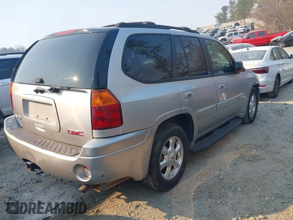 2005 GMC Envoy SLT with VIN 1GKDT13S752251920, listed as a IAAI auction lot 41670725 with 192,509 mi miles. Bid and sale history available at carsss.com. Image 4.