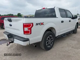 2018 Ford F-150 XL with VIN 1FTEW1C52JKC49228, listed as a IAAI auction lot 42162616 with 148,329 mi miles. Bid and sale history available at carsss.com. Image 4.
