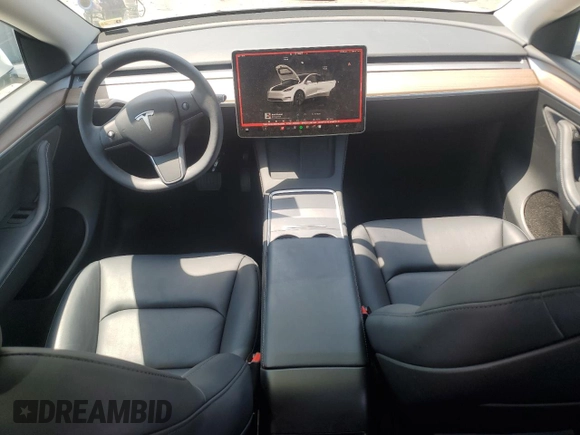 2024 Tesla Model Y с VIN 7SAYGDED3RF182859, выставлен на аукционе Copart как лот 61368825 с пробегом 13 914 миль миль и Списание • Salvage title. История ставок и продаж доступна на DreamBid. Изображение 8.