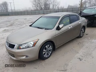 2010 Honda Accord EX z VIN 5KBCP3F73AB004739, wystawiony jako IAAI lot #41527668 z przebiegiem 206 667 mil mil oraz . Historia ofert i sprzedaży dostępna na DreamBid. Obrazek 2.