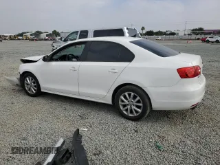 2012 Volkswagen Jetta SE with VIN 3VWDP7AJ9CM364672, listed as a Copart auction lot 61309775 with 124,965 mi miles and Salvage title. Bid and sale history available at DreamBid. Image 2.