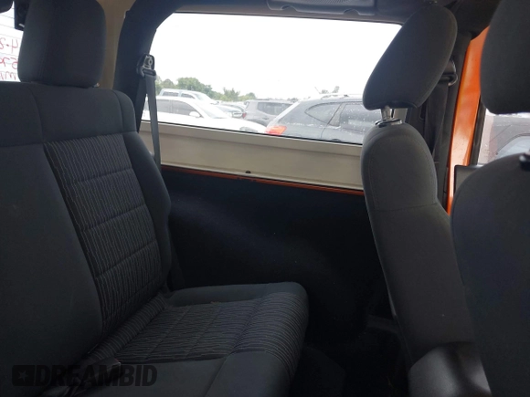 2011 Jeep Wrangler Sport with VIN 1J4AA2D1XBL579882, listed as a IAAI auction lot 42122353 with 153,885 mi miles and . Bid and sale history available at carsss.com. Image 8.