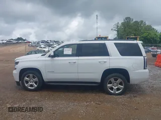 2017 Chevrolet Tahoe LS with VIN 1GNSCAKC7HR342637, listed as a IAAI auction lot 42335097 with 149,736 mi miles and . Bid and sale history available at DreamBid. Image 14.