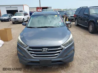 2017 Hyundai Tucson SE Plus with VIN KM8J33A42HU375273, listed as a IAAI auction lot 41900474 with 124,658 mi miles. Bid and sale history available at carsss.com. Image 12.