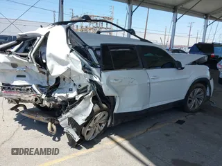 2021 Volkswagen Atlas SE z VIN 1V2HR2CA8MC514027, wystawiony jako IAAI lot #42260413 z przebiegiem 37 687 mil mil oraz . Historia ofert i sprzedaży dostępna na DreamBid. Obrazek 4.