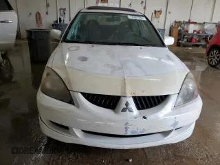 2004 Mitsubishi Lancer with VIN JA3AJ66F64U029144, listed as a Copart auction lot 77437234 with 158,049 mi miles and Salvage Title. Bid and sale history available at DreamBid. Image 5.