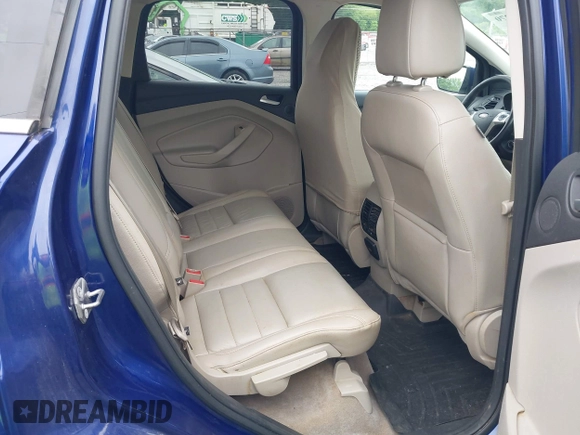 2016 Ford Escape SE z VIN 1FMCU9GX9GUB75094, wystawiony jako IAAI lot #42331270 z przebiegiem 162 288 mil mil oraz . Historia ofert i sprzedaży dostępna na DreamBid. Obrazek 8.