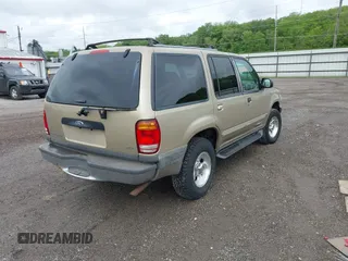1999 Ford Explorer XLT with VIN 1FMZU34E0XZB98745, listed as a IAAI auction lot 42291282 with 174,133 mi miles and . Bid and sale history available at DreamBid. Image 4.