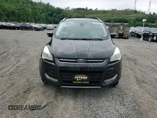 2015 Ford Escape Titanium with VIN 1FMCU9J95FUC36112, listed as a Copart auction lot 61374015 with 111,041 mi miles and Salvage title. Bid and sale history available at DreamBid. Image 14.