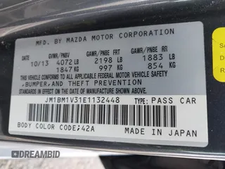 2014 Mazda 3 S Touring with VIN JM1BM1V31E1132448, listed as a IAAI auction lot 41815085 with 144,705 mi miles and . Bid and sale history available at DreamBid. Image 9.