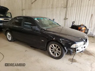 2001 BMW 5 Series 530iA with VIN WBADT63461CF04935, listed as a Copart auction lot 61252214 with 186,050 mi miles and Salvage Title. Bid and sale history available at carsss.com. Image 4.