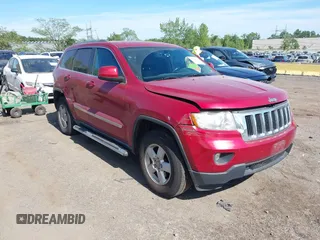 2011 Jeep Grand Cherokee Laredo with VIN 1J4RR4GG4BC553172, listed as a IAAI auction lot 42744844 with 182,948 mi miles and . Bid and sale history available at DreamBid. Image 1.