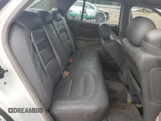 2002 Cadillac DeVille z VIN 1G6KD54Y42U247207, wystawiony jako Copart lot #77691724 z przebiegiem 71 514 mil mil oraz Szkody całkowita. Historia ofert i sprzedaży dostępna na DreamBid. Obrazek 10.