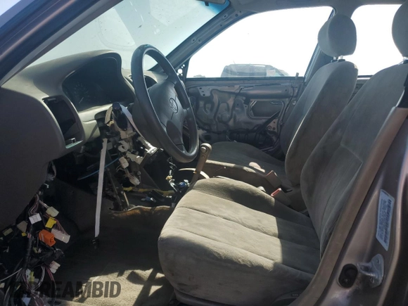 1998 Toyota Corolla VE with VIN 1NXBR18E9WZ035430, listed as a Copart auction lot 59362195 with Not provided miles and Salvage title. Bid and sale history available at DreamBid. Image 7.