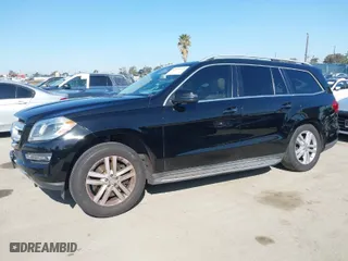 2013 Mercedes-Benz GL-Class GL 450 with VIN 4JGDF7CE9DA233788, listed as a IAAI auction lot 41929994 with 144,388 mi miles. Bid and sale history available at carsss.com. Image 14.
