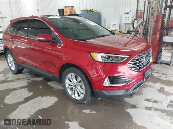 2020 Ford Edge Titanium z VIN 2FMPK4K98LBB39819, wystawiony jako IAAI lot #41947377 z przebiegiem 69 467 mil mil oraz . Historia ofert i sprzedaży dostępna na DreamBid. Obrazek 1.