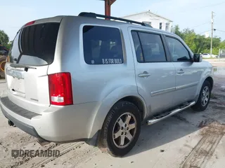 2009 Honda Pilot Touring z VIN 5FNYF38839B022943, wystawiony jako IAAI lot #42443006 z przebiegiem 199 184 mil mil oraz . Historia ofert i sprzedaży dostępna na DreamBid. Obrazek 4.