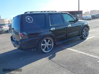 2005 Ford Expedition Eddie Bauer with VIN 1FMPU17505LA25797, listed as a IAAI auction lot 41860548 with 130,044 mi miles. Bid and sale history available at carsss.com. Image 4.