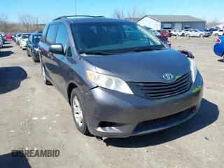2011 Toyota Sienna with VIN 5TDZK3DC6BS125737, listed as a IAAI auction lot 41815233 with 248,318 mi miles. Bid and sale history available at carsss.com. Image 1.