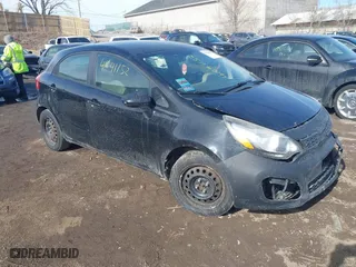 2013 Kia Rio LX with VIN KNADM5A37D6158492, listed as a IAAI auction lot 41641152 with 175,312 mi miles. Bid and sale history available at carsss.com. Image 1.
