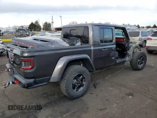 2021 Jeep Gladiator Rubicon with VIN 1C6JJTBG4ML504141, listed as a Copart auction lot 43367565 with 56,879 mi miles and Salvage title. Bid and sale history available at DreamBid. Image 3.