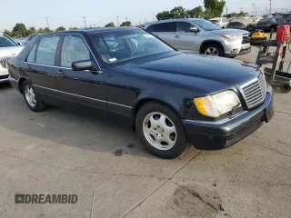 1999 Mercedes-Benz S with VIN WDBGA57G5XA428158, listed as a Copart auction lot 65543515 with 65,698 mi miles and Salvage title. Bid and sale history available at DreamBid. Image 4.