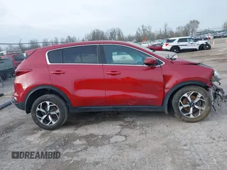2020 Kia Sportage LX z VIN KNDPMCAC0L7697209, wystawiony jako IAAI lot #41795208 z przebiegiem 129 188 mil mil oraz . Historia ofert i sprzedaży dostępna na DreamBid. Obrazek 13.