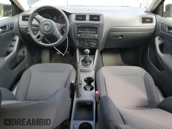 2012 Volkswagen Jetta S with VIN 3VW1K7AJ4CM327157, listed as a Copart auction lot 62657405 with 94,472 mi miles and Salvage title. Bid and sale history available at DreamBid. Image 8.