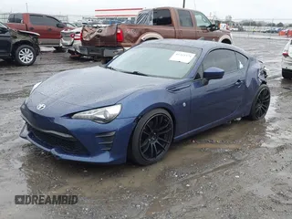 2017 Toyota 86 with VIN JF1ZNAA12H9703408, listed as a IAAI auction lot 41311374 with 90,661 mi miles. Bid and sale history available at carsss.com. Image 2.